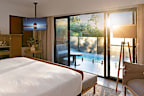 <p>Airport hotels aren't usually sexy – and neither, to be honest, are Mercures. However, pool villas, a larger-than-Olympic-sized regular pool and sustainability programs certainly are, meaning <a href="https://all.accor.com/hotel/A209/index.en.shtml" target="_blank">this resort</a> by Darwin Airport might just become a destination in itself.</p><p>Different areas of the property are dedicated to different Northern Territory regions, and Larrakia guides will lead guests on walking tours to a nearby creek. There will also be an onsite Indigenous Training Academy to staff up the hotel.</p><p>But what are the rooms like? Existing ones have been refurbished, and new pool villas, suites and bungalows have been added to the mix.</p><p>Pool villas are cute cabins with patio doors opening on the open-to-the-elements plunge pools, while the bungalows will be wood-clad, tropical spaces. Even regular rooms have been given some va-va-voom with bright, clashing colours.</p>