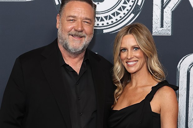 Russell Crowe and Britney Theriot attend the Australian Premiere of Poker Face at Hoyts Entertainment Quarter on November 15, 2022 in Sydney, Australia.