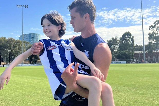 Imogen Mulgrew met AFL player Charlie Comben during her cancer treatment.
