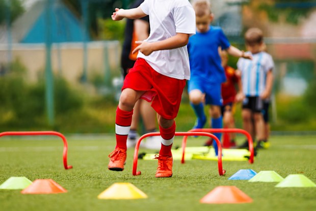 Players Training soccer on the Field. 