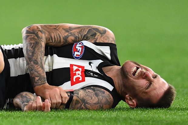 Jeremy Howe lays on the ground in pain.