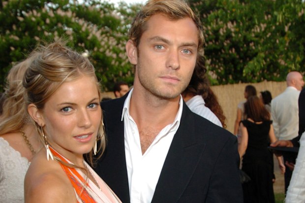 Sienna Miller and Jude Law in London in June 2004.