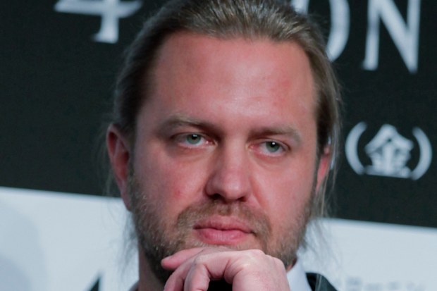 FILE - Director Carl Rinsch poses for photographers during a news conference to promote his 3-D film "47 RONIN" in Tokyo, Japan, Nov. 18, 2013. (AP Photo/Shuji Kajiyama, File)