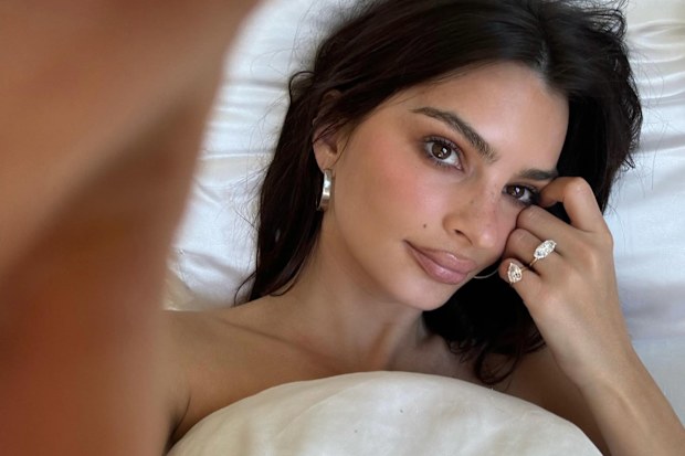 Emily Ratajkowski shows off her new divorce rings.