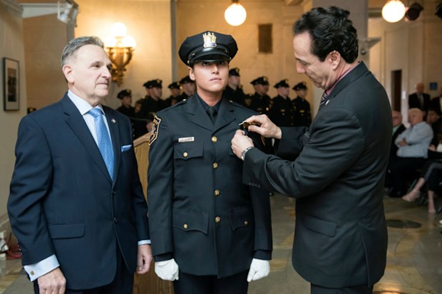 Kristen Hyman being sworn in during an academy graduation on June 8 last year. (AAP)