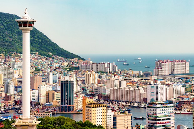 Busan Jung-gu aerial view panorama with tower and a clear sky.