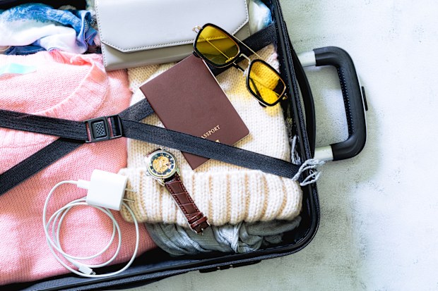 Luggage and travel,costume Travel equipment. Passport, suitcase, sunglasses, travel map fee prepared for the trip,phone charger