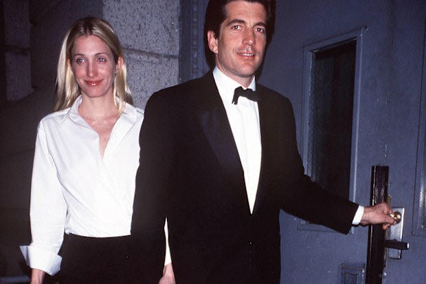 John F. Kennedy Jr. and wife Carolyn Bessette Kennedy return to their New York City apartment March 9, 1999 after an evening out. 