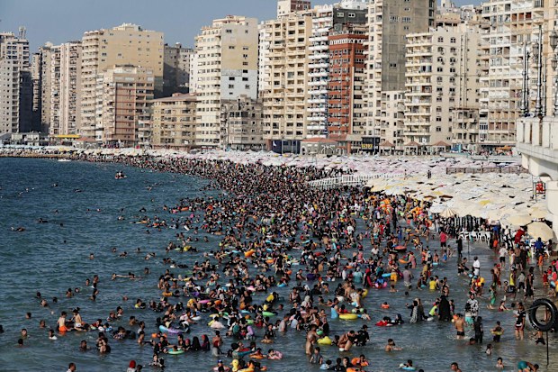 A crowded beach in Egypt's Mediterranean city of Alexandria in July