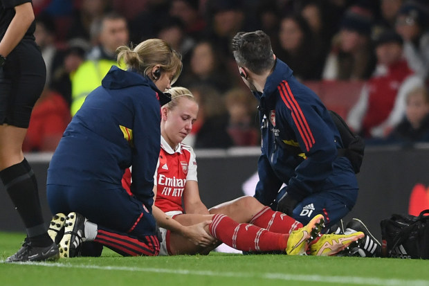 Beth Mead of Arsenal receives medical treatment during the FA Women's Super League match between Arsenal and Manchester United in 2022 after blowing her ACL out. 