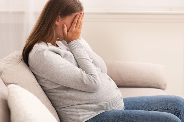 The woman was devastated at her husband's reaction. 