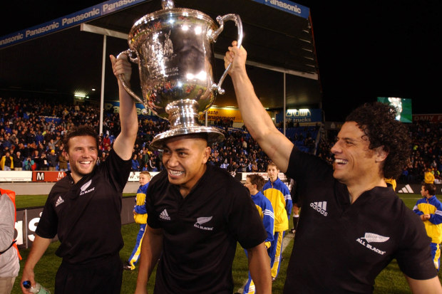All Blacks Aaron Mauger, Jerry Collins and Doug Howlett celebrate with the Bledisloe Cup.
