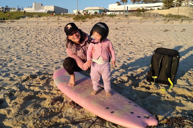Candice from Surfing Mums Australia on the beach. 