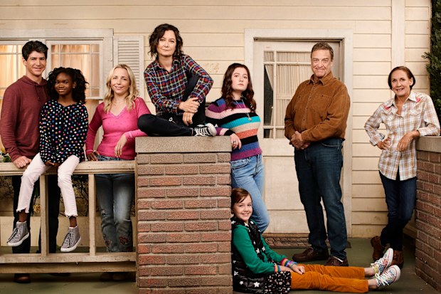 The Conners cast (from left to right): Michael Fishman, Jayden Rey, Lecy Goranson, Sara Gilbert, Emma Kenney, Ames McNamara, John Goodman and Laurie Metcalf.
