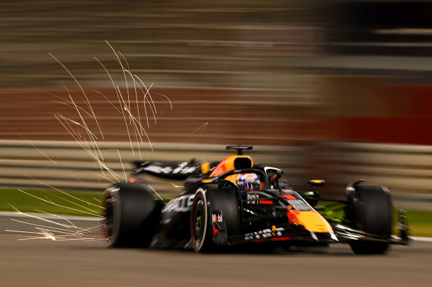 Sparks fly behind Max Verstappen at the Bahrain Grand Prix.