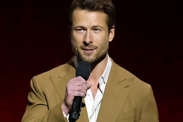 LAS VEGAS, NEVADA - APRIL 03: Glen Powell promotes the upcoming film "The Running Man" at the Paramount Pictures presentation during CinemaCon, the official convention of Cinema United, at The Colosseum at Caesars Palace on April 03, 2025 in Las Vegas, Nevada. (Photo by Ethan Miller/Getty Images)