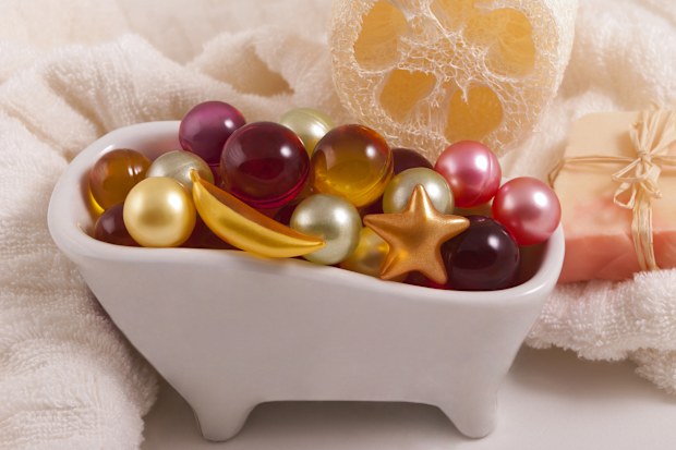 Bath oil pearls in a small dish