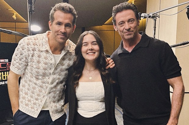 9honey senior journalist Maddison Leach with Ryan Reynolds and Hugh Jackman in Seoul, South Korea.