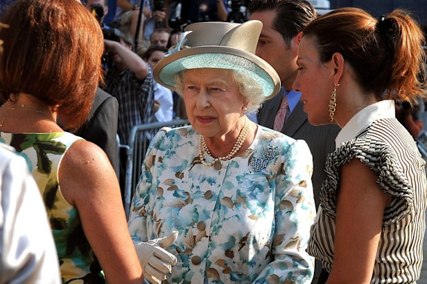Queen Elizabeth II talks to families of some of the victims of the 9/11 terrorist attacks after she laid a wreath at the site of the World Trade Centre, in New York City in 2010 (Photo by John Stillwell/PA Images via Getty Images)