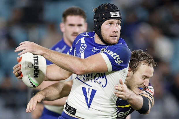 SYDNEY, AUSTRALIA - MAY 22: Matt Burton of the Bulldogs is tackled during the round 12 NRL match between Canterbury Bulldogs and Melbourne Storm at Accor Stadium, on May 22, 2026, in Sydney, Australia. (Photo by Darrian Traynor/Getty Images)
