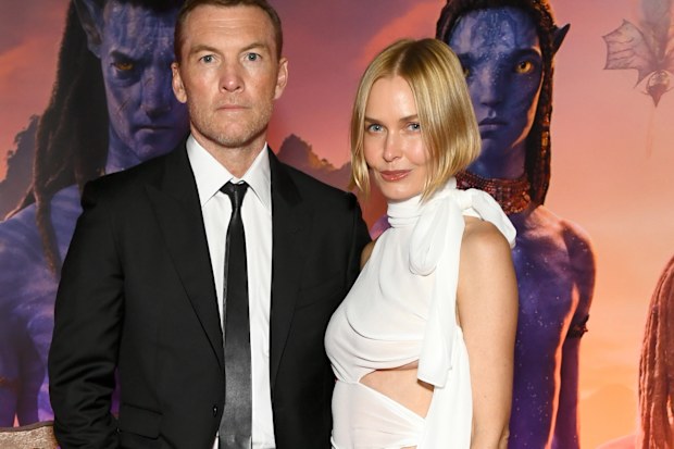 Sam Worthington and Lara Worthington attend the world premiere of 20th Century Studios "Avatar: Fire and Ash"