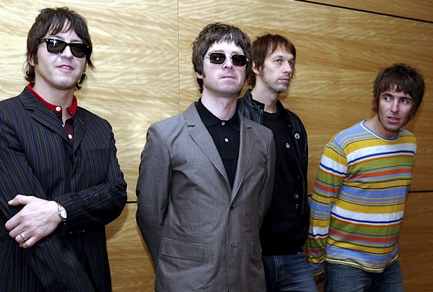 Members of British rock band Oasis  (L-R: Gem Archer, Noel Gallagher, Andy Bell, and Liam Gallagher)