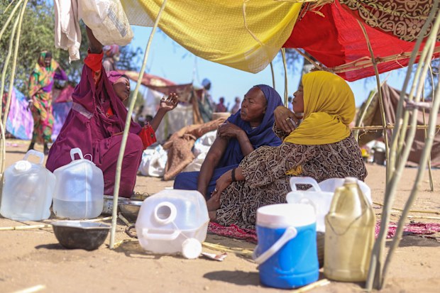 Sudanese who fled el-Fasher city, after Sudan's paramilitary forces killed hundreds of people in the western Darfur region, speak at their camp in Tawila, Sudan, Wednesday, Oct. 29, 2025.