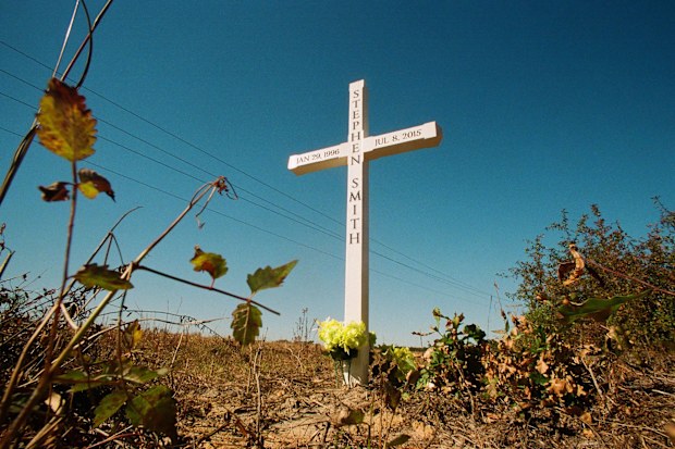 A roadside wooden cross marks the spot where Stephen Smith's body was found on Sandy Run Road in rural Hampton County, S.C.