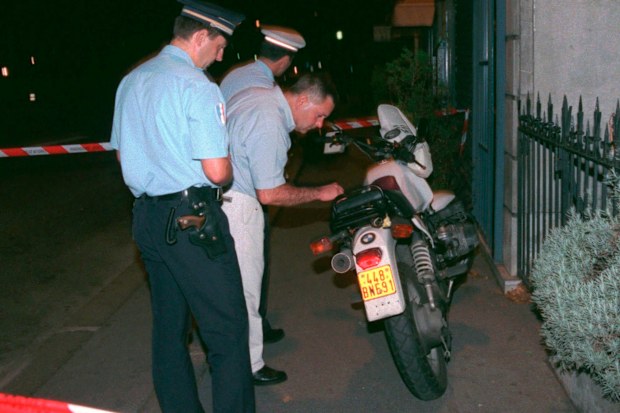 Police seize the motorbike of a photographer who was chasing the car of Diana, Princess of Wales, when it crashed in a tunnel along the Seine river
