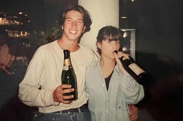Kerri and Dirk met while traveling with their families in Europe and became close right away. "There are pictures of us with bottles of champagne we'd taken at dinner," says Dirk. Courtesy Kerri Cunningham and Dirk Stevens via CNN Newsource 