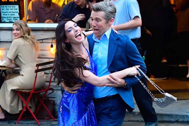 Anne Hathaway and Patrick Brammall are seen on the set of The Devil Wears Prada 2 in Brooklyn  on August 5, 2025 in New York City