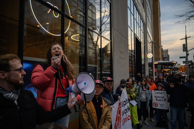 Members of the Alphabet Workers Union (CWA) hold a rally outside the Google office in response to recent layoffs, in New York on February 2, 2023. - Google's parent company Alphabet announced in January it will cut about 12,000 jobs globally, citing a changing economic reality. (Photo by Ed JONES / AFP) (Photo by ED JONES/AFP via Getty Images)