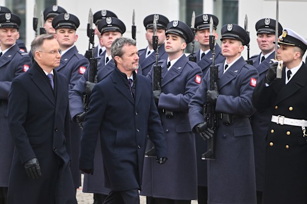 The President of Poland, Andrzej Duda and King Frederik X Of Denmark walk past the honour guards during a welcome ceremony at the Presidential Palace on January 31, 2024 in Warsaw, Poland.