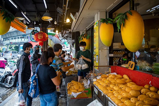 People line up outside of Bangkok's Mae Varee shop in 2022. **This image is for use with this specific article only** 