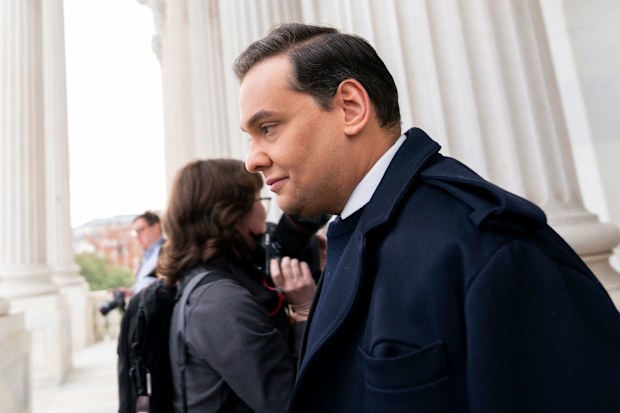 Rep. George Santos, R-N.Y., leaves the Capitol after being expelled from the House of Representatives, Friday, Dec. 1, 2023, in Washington.