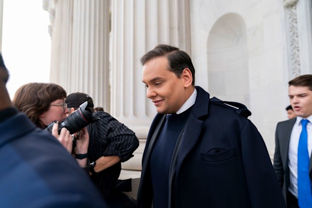 Rep. George Santos, R-N.Y., leaves the Capitol after being expelled from the House of Representatives, Friday, Dec. 1, 2023, in Washington.