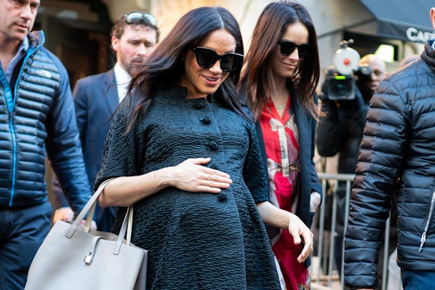 Meghan, Duchess of Sussex (L) and Abigail Spencer are seen in the Upper East Side on February 19, 2019 in New York City. 