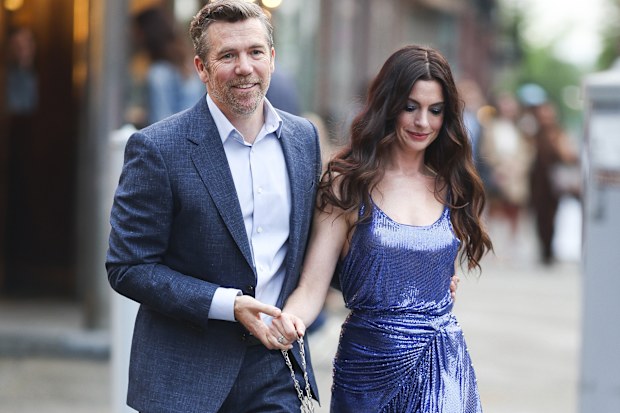Patrick Brammall and Anne Hathaway seen on the set of The Devil Wears Prada 2 in Brooklyn on August 5, 2025 in New York City