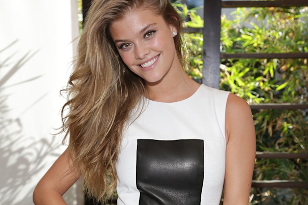 Sports Illustrated Cover Model Nina Agdal poses during the Captain Morgan White Rum and Sports Illustrated Swimsuit's 50th anniversary poolside celebration at Fontainebleau Miami Beach on February 19, 2014 in Miami Beach, Florida. 