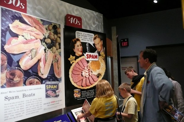 A family from Western Illinois peruses the history of Spam at the Spam Museum in Austin, Minnesota. (Josh Noel/Minneapolis Star Tribune/Tribune News Service via Getty Images)