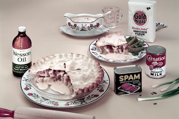 View of a pie made with Spam-brand canned meat, potatoes, scallions, and cream of mushroom soup among other ingredients, some of which are pictured along with a rolling pin for making the pie's shell, 1950s or 1960s. (Photo by Tom Kelley/Getty Images)