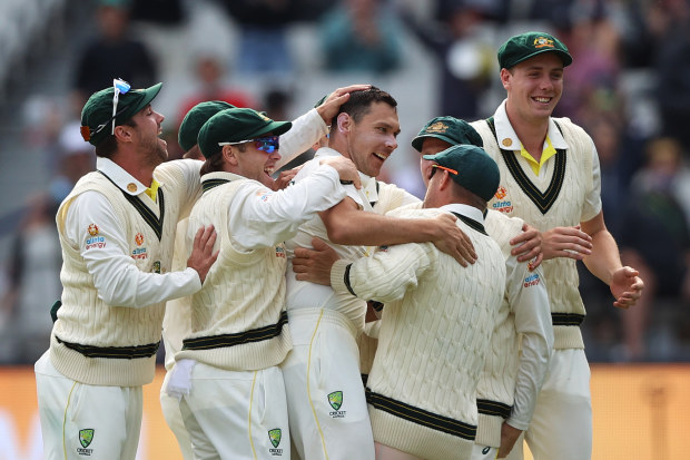 Scott Boland of Australia celebrates with teammates after dismissing Haseeb Hameed.