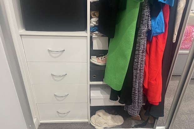 Wardrobe before declutter and reorganising