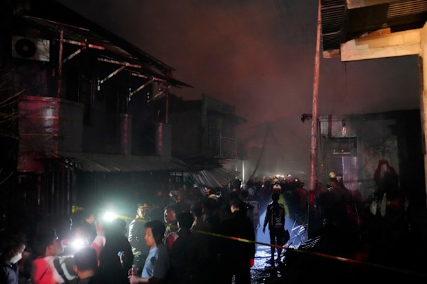 A large fire broke out at a fuel storage depot in Indonesia's capital on Friday, killing at least 17 people, injuring dozens of others and forcing the evacuation of thousands