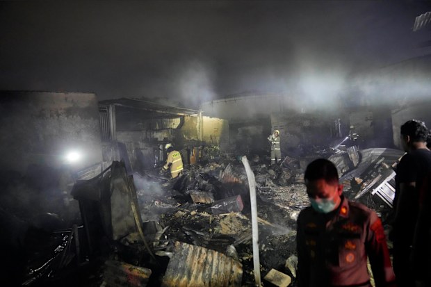 A large fire broke out at a fuel storage depot in Indonesia's capital on Friday, killing at least 17 people, injuring dozens of others and forcing the evacuation of thousands