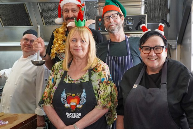 Wayside Chapel's Community Cafe Manager Trish poses with the kitchen's chef