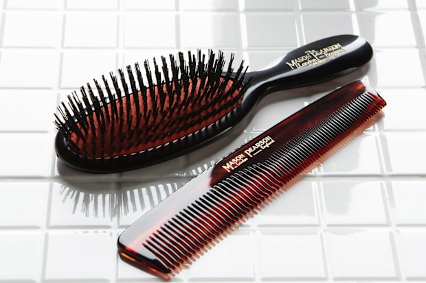 Mason Pearson boar bristle brush and a comb.