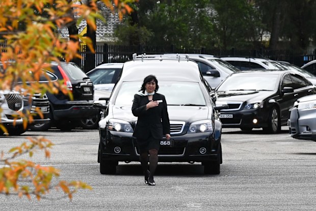 The funeral procession enters the church grounds at Bossley Park.