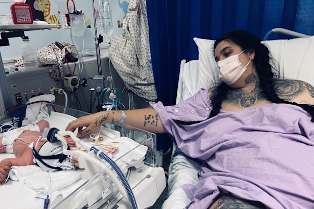 Latoya in hospital with baby Luna.