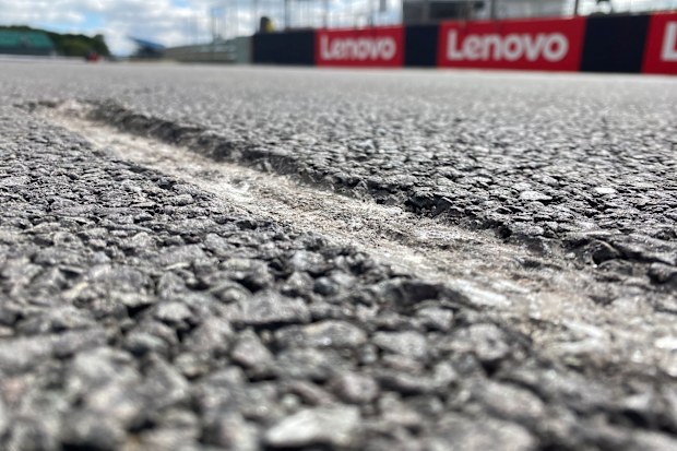 The damage to the track surface caused by Zhou Guanyu's enormous crash on the opening lap of the 2022 British Grand Prix. Photo: Craig Slater